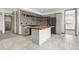 Modern kitchenette features floating shelves, butcher block top, and a gray backsplash at 2400 Ventress Ct, Bennett, CO 80102