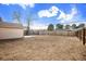 A spacious, fenced backyard ready for outdoor activities and landscaping at 1449 Clinton St, Aurora, CO 80010