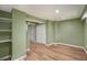 Spacious basement area with durable floors, white trim, and closet at 1449 Clinton St, Aurora, CO 80010