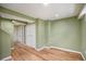 Versatile basement space with vinyl plank flooring, neutral paint, and closet at 1449 Clinton St, Aurora, CO 80010