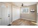 Inviting entryway with light wood floors, closet, and ceiling fan at 1449 Clinton St, Aurora, CO 80010