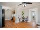 Open kitchen with stainless steel appliances, breakfast table and hardwood floors at 1449 Clinton St, Aurora, CO 80010