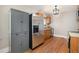 Bright kitchen features stainless steel refrigerator and ample storage at 1449 Clinton St, Aurora, CO 80010