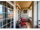 Cozy balcony with red chairs, table, and great view offer residents a relaxing outdoor space at 452 Black Feather Loop # 612, Castle Rock, CO 80104