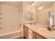 Bright bathroom with double vanity sinks and a shower-tub combination at 452 Black Feather Loop # 612, Castle Rock, CO 80104