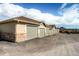 Row of detached garages with modern doors provide ample parking and storage space for residents at 452 Black Feather Loop # 612, Castle Rock, CO 80104