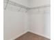 Walk-in closet with wire shelving provides organized storage space in this modern home at 39172 Clymer St, Elizabeth, CO 80107