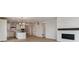 Bright and open living area, adjacent to a contemporary kitchen with stainless steel appliances at 39172 Clymer St, Elizabeth, CO 80107
