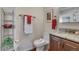 Cozy half bathroom with modern fixtures, including a toilet and sink with granite counters at 4000 Donnington Cir, Castle Rock, CO 80104