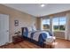 Serene bedroom featuring natural light, scenic views, and elegant decor at 4000 Donnington Cir, Castle Rock, CO 80104