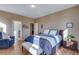 Well-lit bedroom featuring a comfortable bed, stylish furnishings, and a relaxing atmosphere at 4000 Donnington Cir, Castle Rock, CO 80104
