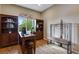 Bright home office with built-in bookshelves and a comfortable workstation at 4000 Donnington Cir, Castle Rock, CO 80104