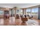 Open living and dining area with hardwood floors and ample natural light at 4000 Donnington Cir, Castle Rock, CO 80104