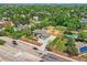 Spacious home with landscaped yard, pool, tennis court, and lush greenery at 10197 E Mississippi Ave, Denver, CO 80247