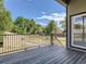 Enjoy serene views from your back deck with sturdy railing and house access at 10197 E Mississippi Ave, Denver, CO 80247