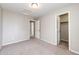 Bright bedroom featuring a closet, neutral walls and soft carpet for a comfortable retreat at 16075 E Elk Pl, Denver, CO 80239