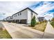 New multi-level home with attached garages and attractive landscaping at 16075 E Elk Pl, Denver, CO 80239