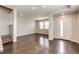 Bright and spacious living room featuring hardwood floors and neutral walls at 16075 E Elk Pl, Denver, CO 80239