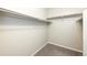Spacious walk-in closet with ample shelving, designed to maximize storage and organization at 16075 E Elk Pl, Denver, CO 80239