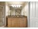 Bathroom with a double sink vanity with granite counters and a glass shower at 4001 W 32Nd Ave # 1, Denver, CO 80212