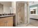 Bathroom with a corner shower and light wood vanity at 4001 W 32Nd Ave # 1, Denver, CO 80212