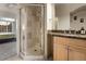 Bright bathroom with glass shower and views into bedroom at 4001 W 32Nd Ave # 1, Denver, CO 80212