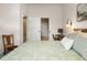 Bedroom featuring a bed, chair and a desk area visible through the doorway at 4001 W 32Nd Ave # 1, Denver, CO 80212