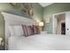 Bedroom featuring a sliding door to the outside and decorations at 4001 W 32Nd Ave # 1, Denver, CO 80212