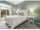Bedroom featuring a sliding door to the outside at 4001 W 32Nd Ave # 1, Denver, CO 80212