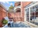 Inviting patio with seating, garden, and balcony above at 4001 W 32Nd Ave # 1, Denver, CO 80212