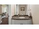 Granite countertop and vanity in this powder room at 4001 W 32Nd Ave # 1, Denver, CO 80212