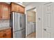 Convenient laundry room located off the kitchen with modern appliances at 21422 E 47Th Ave, Denver, CO 80249