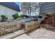 Fenced backyard featuring a mature landscaped area at 6844 S Broadway, Littleton, CO 80122