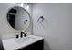 Modern bathroom features a sleek vanity, contemporary fixtures, and stylish design at 6844 S Broadway, Littleton, CO 80122