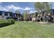 Exterior view of the complex with large grass area at 6844 S Broadway, Littleton, CO 80122