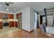 Updated kitchen featuring stainless steel appliances and hardwood floors at 6844 S Broadway, Littleton, CO 80122