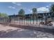 Community Pool with fencing and brick pavers at 6844 S Broadway, Littleton, CO 80122