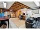 Unfinished basement area with a desk, computer, and chair setup at 11094 Thomas Dr, Conifer, CO 80433