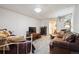 Inviting living room offers a cozy sitting area with television and comfortable leather seating at 11094 Thomas Dr, Conifer, CO 80433