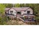 Spacious deck with multiple levels, perfect for outdoor entertainment and relaxation at 11094 Thomas Dr, Conifer, CO 80433