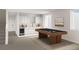 Finished basement with a recreation area, kitchenette, and wet bar at 2453 Julian St, Denver, CO 80211