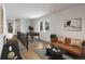 Upstairs loft area with foosball table, comfortable seating, and natural light at 2453 Julian St, Denver, CO 80211