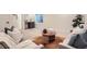 Finished basement Gathering room with comfortable seating at 1717 Grove St, Denver, CO 80204