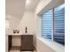 Basement wet bar with modern sink and cabinets at 1717 Grove St, Denver, CO 80204