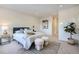 Spacious bedroom with a queen bed and plenty of natural light at 1717 Grove St, Denver, CO 80204
