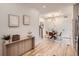 Bright dining area with glass table and hardwood floors at 1717 Grove St, Denver, CO 80204