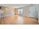 Bright living room with hardwood floors, ample natural light, and a neutral color palette at 3334 Navajo St, Denver, CO 80211