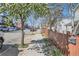 Charming street view lined with mature trees and sidewalks, highlighting the neighborhood's peaceful setting at 3334 Navajo St, Denver, CO 80211