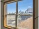 View of the city skyline from a large window, filling the room with natural light at 3334 Navajo St, Denver, CO 80211
