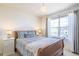 Serene bedroom with a cozy bed, natural light, and minimalist decor at 3754 Broadview Pl, Castle Rock, CO 80109